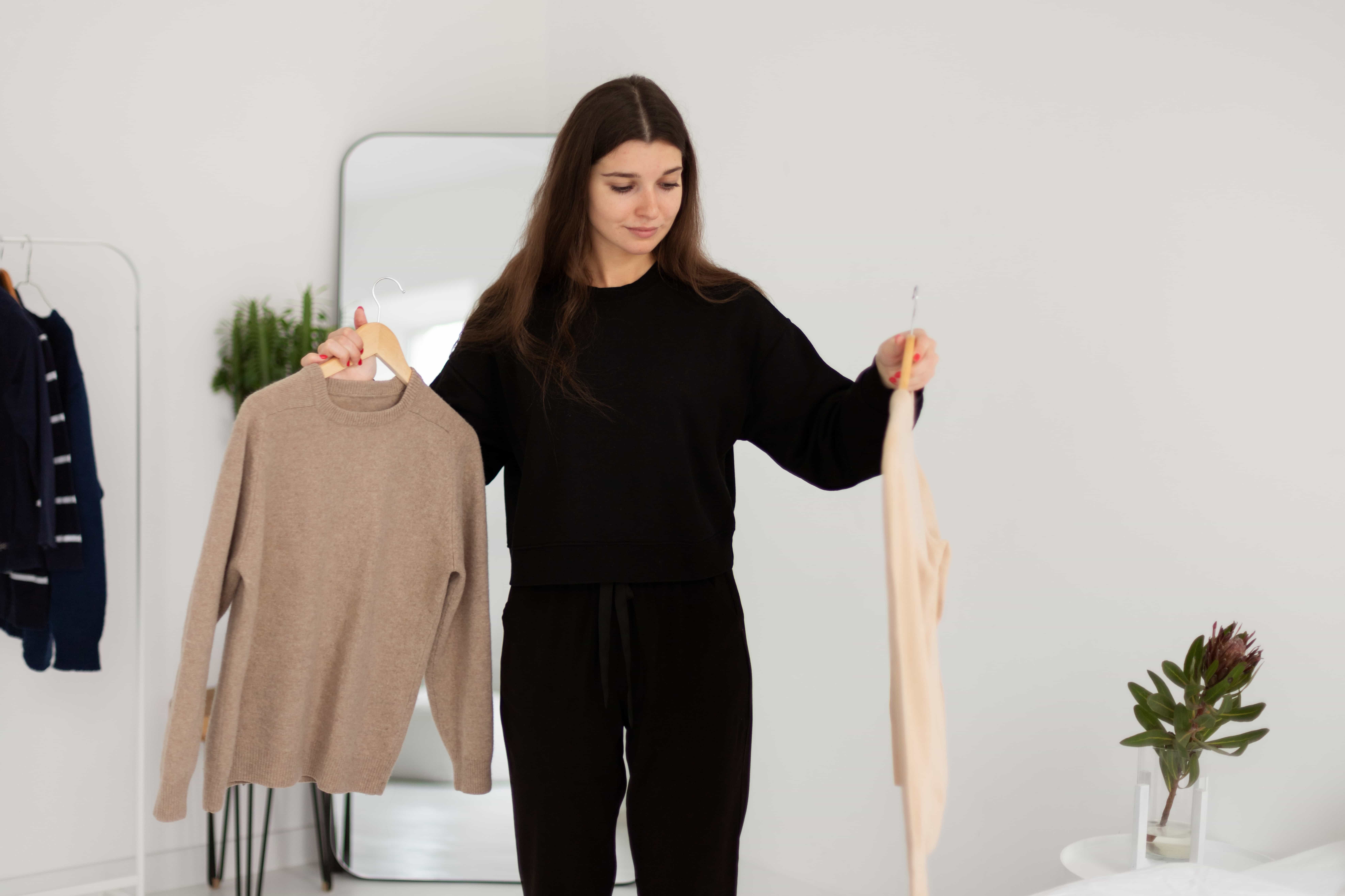 A woman trying out new clothes
